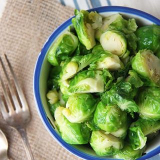 Honey Glazed Brussels Sprouts - perfect for a side dish. Hot, buttery and sweet, these are a must have www.thehomecookskitchen.com