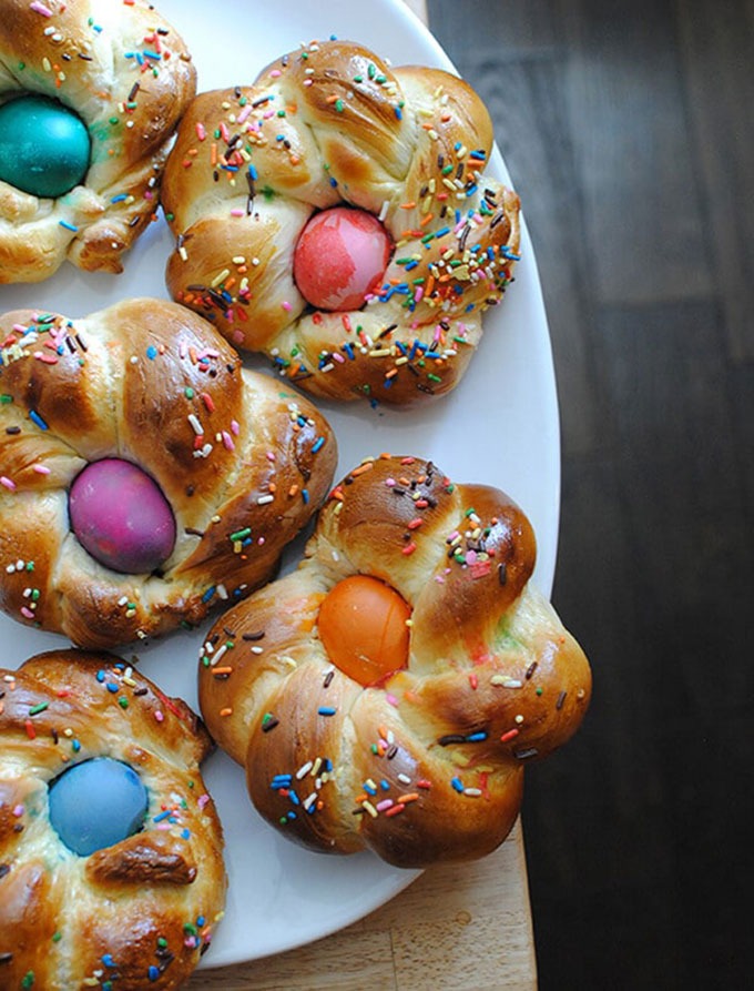 colourful eggs in a baked dough sitting in a plate