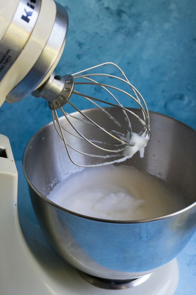 stiff peaks on a whisk attached to a kitchen aid