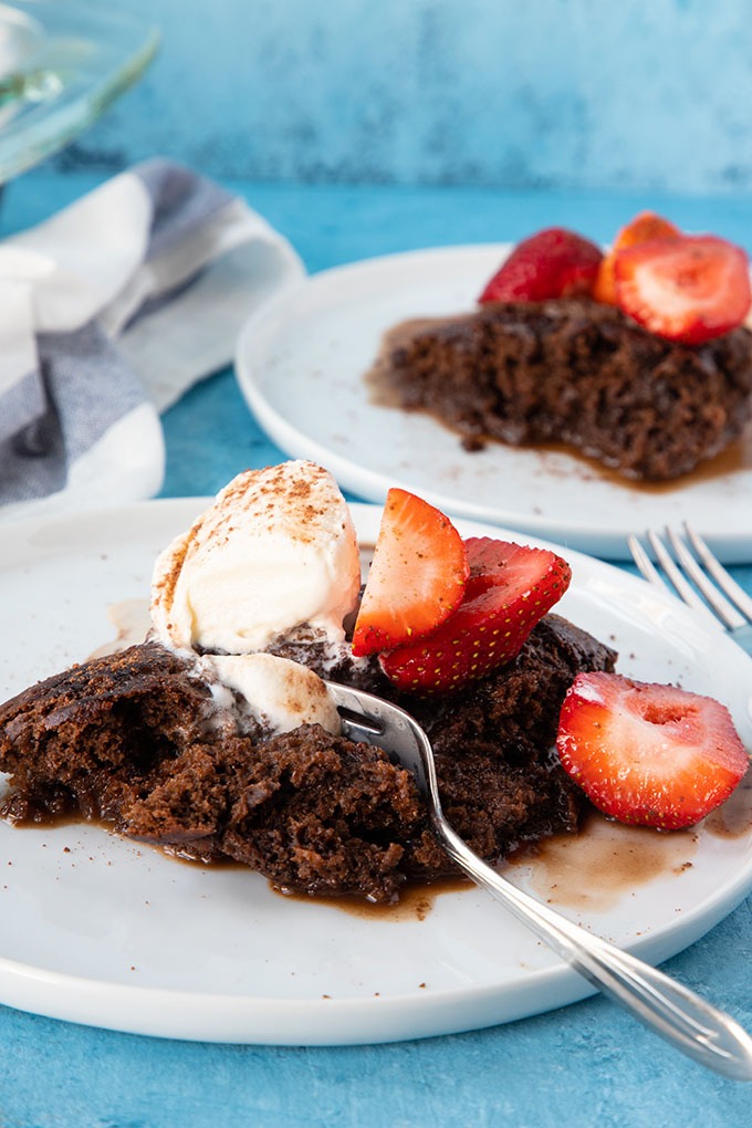 chocolate self saucing pudding on white plate 