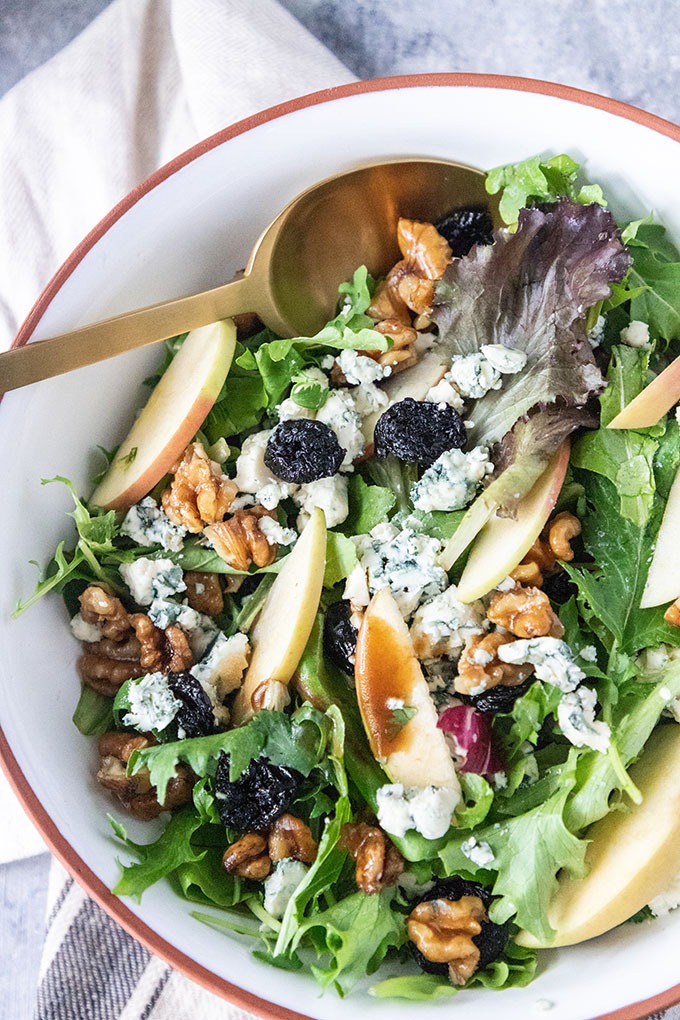 fall harvest salad in white and brown bowl