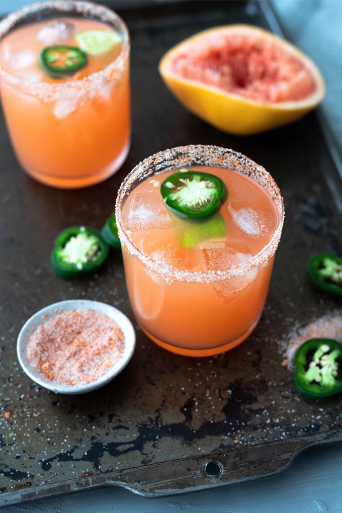 one spicy margarita on tray with salt tray