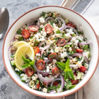 israeli couscous salad in large bowl
