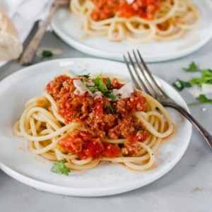 spaghetti all'amatriciana on white plate