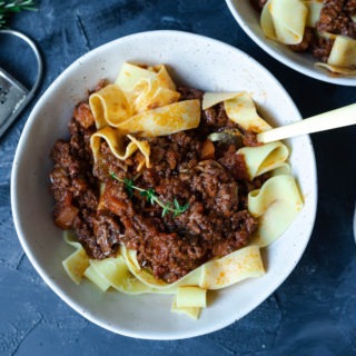 lamb rags with pappardelle in a bowl