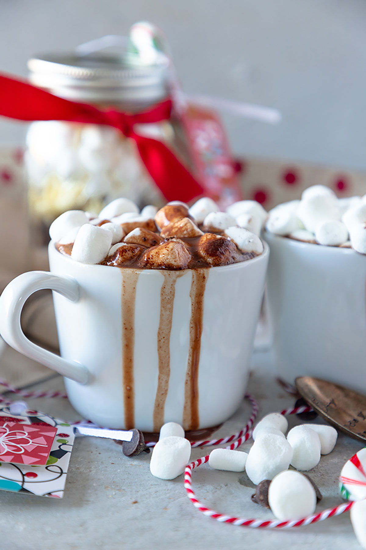 hot chocolate in a white mug with marshmallows