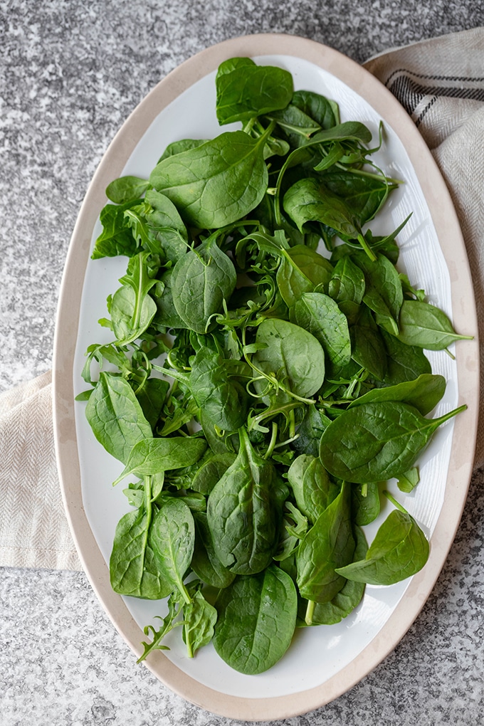 salad greens on large platter