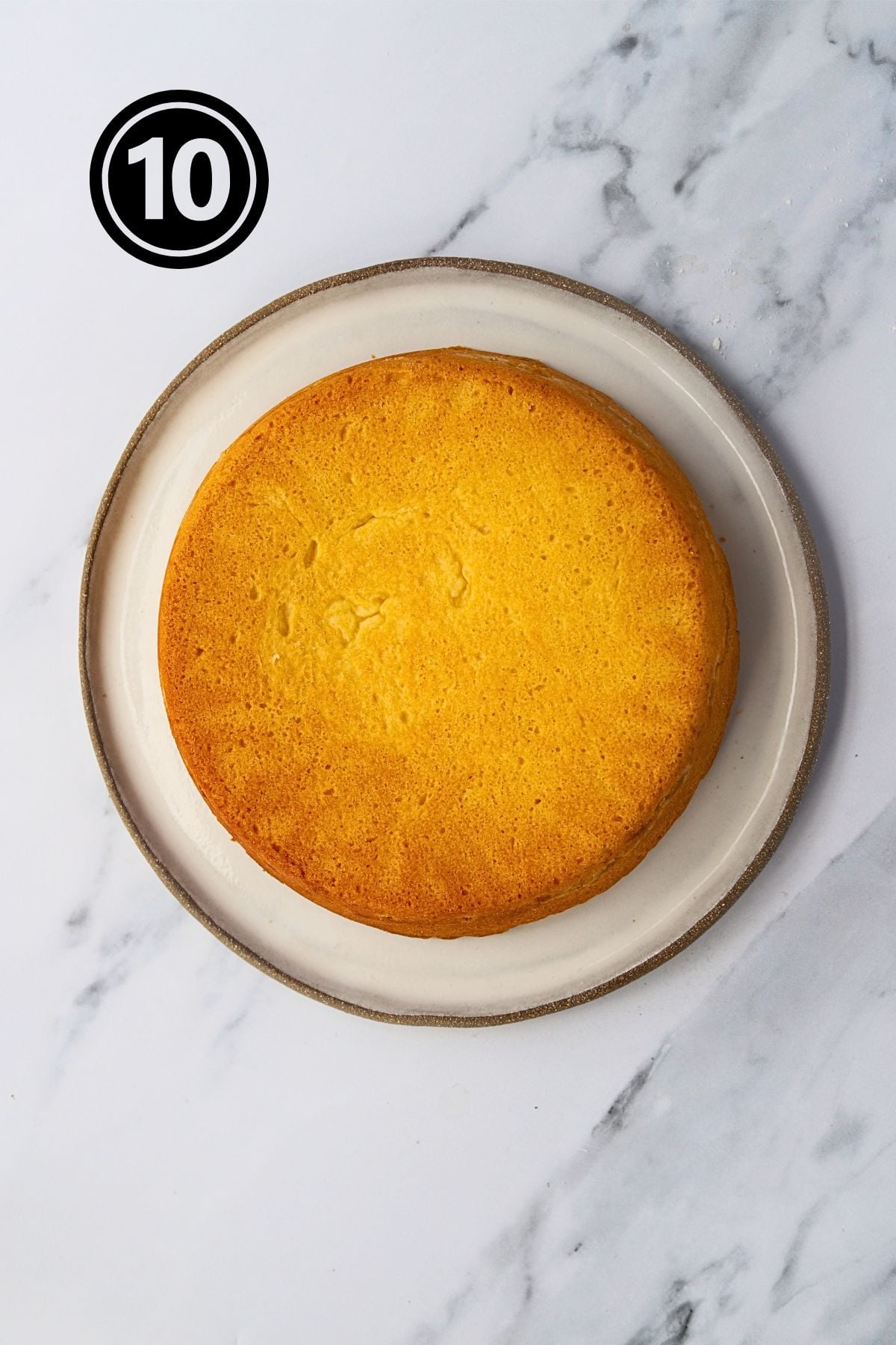 cooked apple cake on a plate on a board.