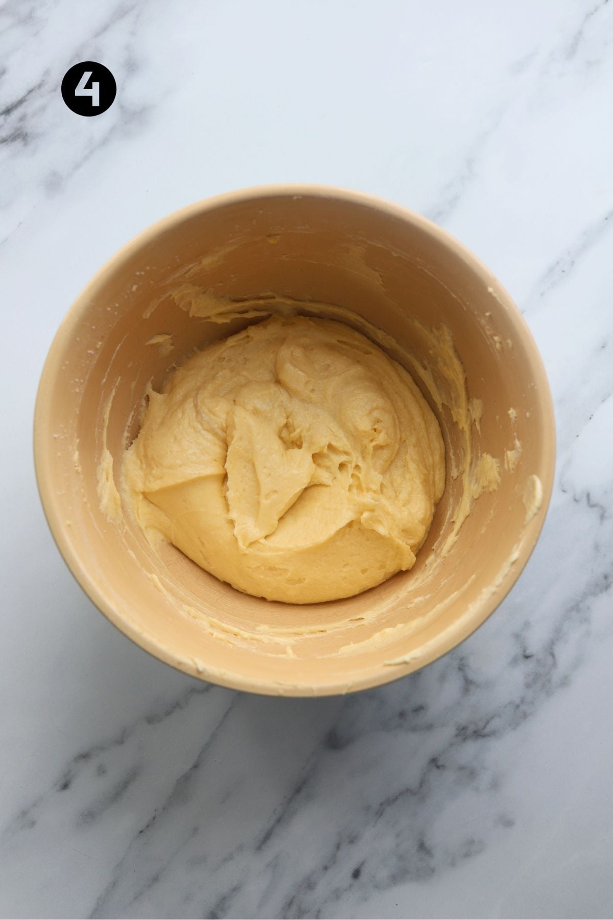 Sour cream folded into batter thinning it out slightly.