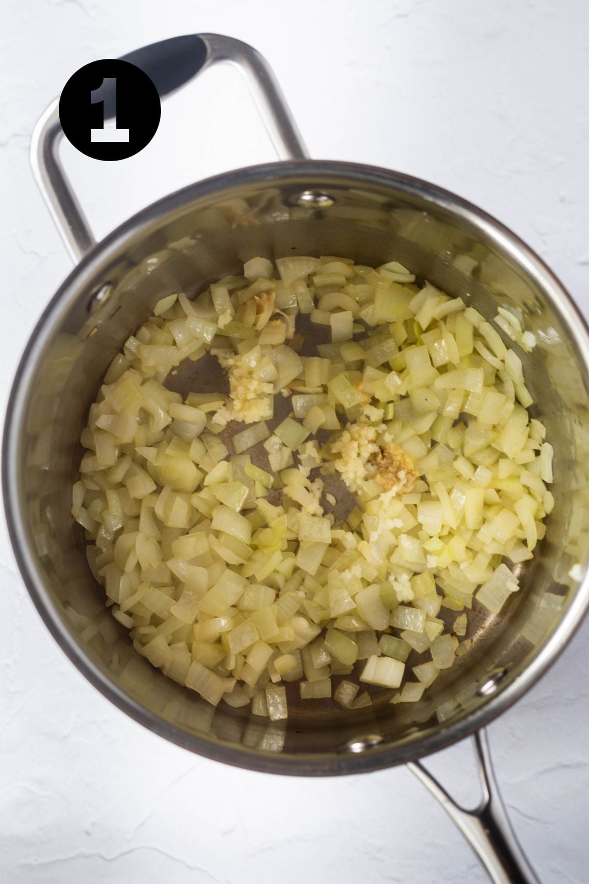 onions cooking in a large heavy-based saucepan.