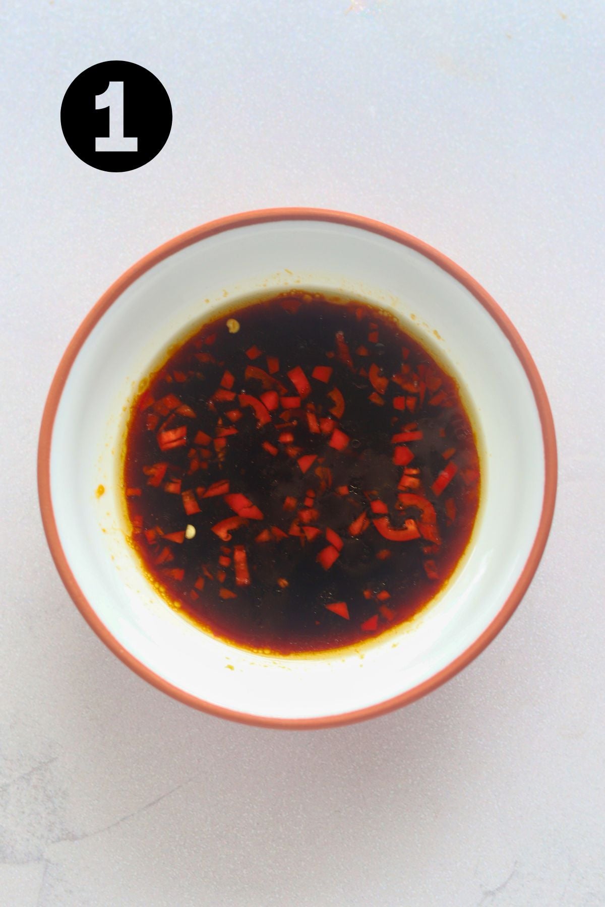 Thai Salad dressing mixed together in a small bowl.