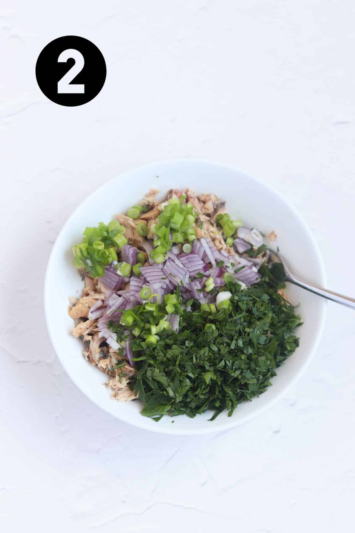 parsley, red onion and green onion added to small bowl.